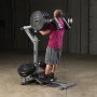Голень стоя и Гакк приседания силовой тренажер Body-Solid GSCL360 на свободных весах